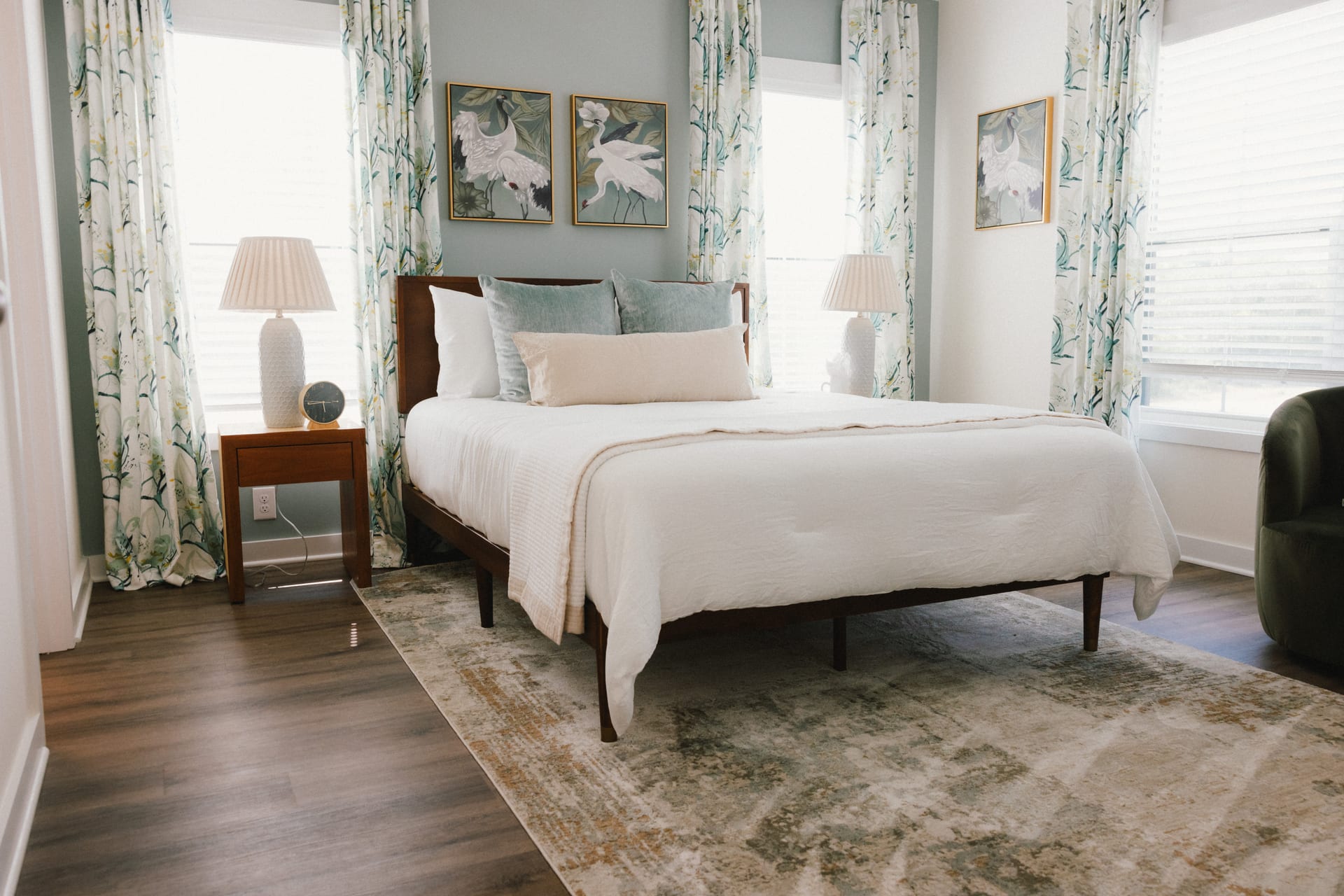 Legends Townhomes: bedroom with patterned curtains and a window seat